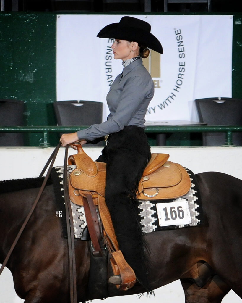 Pats Chaps custom black chaps help create a winning look for western horsemanship.